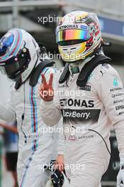 Lewis Hamilton (GBR) Mercedes AMG F1 celebrates his pole position in parc ferme. 14.03.2015. Formula 1 World Championship, Rd 1, Australian Grand Prix, Albert Park, Melbourne, Australia, Qualifying Day.