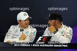 (L to R): Nico Rosberg (GER) Mercedes AMG F1 with pole sitter Lewis Hamilton (GBR) Mercedes AMG F1 in the FIA Press Conference. 14.03.2015. Formula 1 World Championship, Rd 1, Australian Grand Prix, Albert Park, Melbourne, Australia, Qualifying Day.