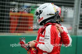Sebastian Vettel (GER) Ferrari and team mate Kimi Raikkonen (FIN) Ferrari in parc ferme. 14.03.2015. Formula 1 World Championship, Rd 1, Australian Grand Prix, Albert Park, Melbourne, Australia, Qualifying Day.