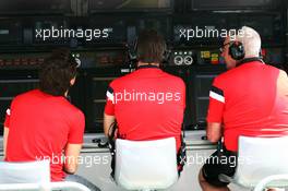 (L to R): Roberto Merhi (ESP) Manor Marussia F1 Team; Graeme Lowdon (GBR) Manor Marussia F1 Team Chief Executive Officer; and John Booth (GBR) Manor Marussia F1 Team Team Principal on the pit gantry. 14.03.2015. Formula 1 World Championship, Rd 1, Australian Grand Prix, Albert Park, Melbourne, Australia, Qualifying Day.