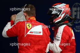 Sebastian Vettel (GER) Ferrari SF15-T and Kimi Raikkonen (FIN) Ferrari. 14.03.2015. Formula 1 World Championship, Rd 1, Australian Grand Prix, Albert Park, Melbourne, Australia, Qualifying Day.