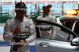 Lewis Hamilton (GBR) Mercedes AMG F1 W06 and Nico Rosberg (GER) Mercedes AMG F1. 14.03.2015. Formula 1 World Championship, Rd 1, Australian Grand Prix, Albert Park, Melbourne, Australia, Qualifying Day.