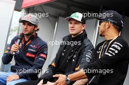 (L to R): Carlos Sainz Jr (ESP) Scuderia Toro Rosso; Nico Hulkenberg (GER) Sahara Force India F1; and Lewis Hamilton (GBR) Mercedes AMG F1 on the Autograph Stage. 15.03.2015. Formula 1 World Championship, Rd 1, Australian Grand Prix, Albert Park, Melbourne, Australia, Race Day.