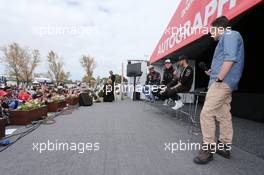 (L to R): Carlos Sainz Jr (ESP) Scuderia Toro Rosso; Nico Hulkenberg (GER) Sahara Force India F1; Lewis Hamilton (GBR) Mercedes AMG F1; and Will Buxton (GBR) NBS Sports Network TV Presenter on the Autograph Stage. 15.03.2015. Formula 1 World Championship, Rd 1, Australian Grand Prix, Albert Park, Melbourne, Australia, Race Day.