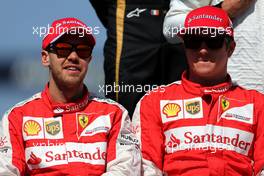 Sebastian Vettel (GER), Scuderia Ferrari and Kimi Raikkonen (FIN), Scuderia Ferrari  15.03.2015. Formula 1 World Championship, Rd 1, Australian Grand Prix, Albert Park, Melbourne, Australia, Race Day.