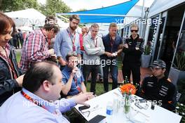 Sergio Perez (MEX) Sahara Force India F1 with the media. 12.03.2015. Formula 1 World Championship, Rd 1, Australian Grand Prix, Albert Park, Melbourne, Australia, Preparation Day.