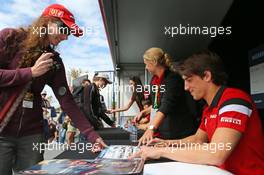 Roberto Merhi (ESP) Manor F1 Team signs autographs for the fans. 12.03.2015. Formula 1 World Championship, Rd 1, Australian Grand Prix, Albert Park, Melbourne, Australia, Preparation Day.