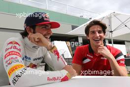Carlos Sainz (ESP), Scuderia Toro Rosso and Roberto Merhi (SPA), Manor F1 Team  12.03.2015. Formula 1 World Championship, Rd 1, Australian Grand Prix, Albert Park, Melbourne, Australia, Preparation Day.