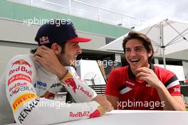 Carlos Sainz (ESP), Scuderia Toro Rosso and Roberto Merhi (SPA), Manor F1 Team  12.03.2015. Formula 1 World Championship, Rd 1, Australian Grand Prix, Albert Park, Melbourne, Australia, Preparation Day.