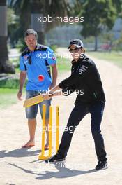 Sergio Perez (MEX) Sahara Force India F1 Team (Right) plays cricket in Albert Park with Brad Hodge (AUS) (Left) International Cricket Player. 10.03.2015. Formula 1 World Championship, Rd 1, Australian Grand Prix, Albert Park, Melbourne, Australia, Preparation Day.