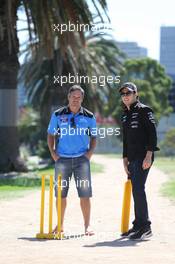 Sergio Perez (MEX) Sahara Force India F1 Team (Right) plays cricket in Albert Park with Brad Hodge (AUS) (Left) International Cricket Player. 10.03.2015. Formula 1 World Championship, Rd 1, Australian Grand Prix, Albert Park, Melbourne, Australia, Preparation Day.