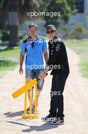 Sergio Perez (MEX) Sahara Force India F1 Team (Right) plays cricket in Albert Park with Brad Hodge (AUS) (Left) International Cricket Player. 10.03.2015. Formula 1 World Championship, Rd 1, Australian Grand Prix, Albert Park, Melbourne, Australia, Preparation Day.