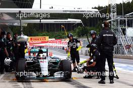 Lewis Hamilton (GBR) Mercedes AMG F1 W06 in the pits. 19.06.2015. Formula 1 World Championship, Rd 8, Austrian Grand Prix, Spielberg, Austria, Practice Day.