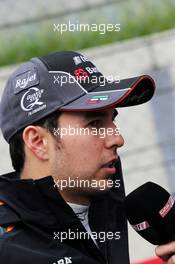 Sergio Perez (MEX) Sahara Force India F1 on the grid. 21.06.2015. Formula 1 World Championship, Rd 8, Austrian Grand Prix, Spielberg, Austria, Race Day.