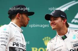 The podium (L to R): second placed Lewis Hamilton (GBR) Mercedes AMG F1 with race winner Nico Rosberg (GER) Mercedes AMG F1. 21.06.2015. Formula 1 World Championship, Rd 8, Austrian Grand Prix, Spielberg, Austria, Race Day.