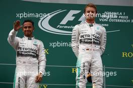 The podium (L to R): second placed Lewis Hamilton (GBR) Mercedes AMG F1 celebrates with race winner Nico Rosberg (GER) Mercedes AMG F1. 21.06.2015. Formula 1 World Championship, Rd 8, Austrian Grand Prix, Spielberg, Austria, Race Day.
