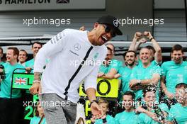 Lewis Hamilton (GBR) Mercedes AMG F1 celebrates with the team. 21.06.2015. Formula 1 World Championship, Rd 8, Austrian Grand Prix, Spielberg, Austria, Race Day.