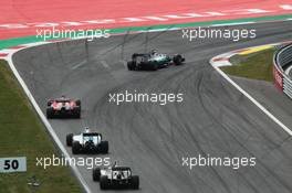 Lewis Hamilton (GBR) Mercedes AMG F1 W06 leads Sebastian Vettel (GER) Ferrari SF15-T, Valtteri Bottas (FIN) Williams FW37 and Nico Hulkenberg (GER) Sahara Force India F1 VJM08. 21.06.2015. Formula 1 World Championship, Rd 8, Austrian Grand Prix, Spielberg, Austria, Race Day.