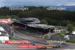 Sergio Perez (MEX), Sahara Force India and Romain Grosjean (FRA), Lotus F1 Team  21.06.2015. Formula 1 World Championship, Rd 8, Austrian Grand Prix, Spielberg, Austria, Race Day.