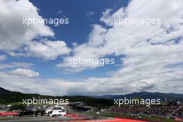 Sergio Perez (MEX), Sahara Force India and Romain Grosjean (FRA), Lotus F1 Team  21.06.2015. Formula 1 World Championship, Rd 8, Austrian Grand Prix, Spielberg, Austria, Race Day.