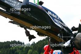 The damaged McLaren MP4-30 of Fernando Alonso (ESP) McLaren. 21.06.2015. Formula 1 World Championship, Rd 8, Austrian Grand Prix, Spielberg, Austria, Race Day.