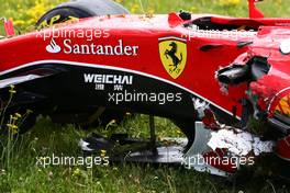 The damaged Ferrari SF15-T of race retiree Kimi Raikkonen (FIN) Ferrari. 21.06.2015. Formula 1 World Championship, Rd 8, Austrian Grand Prix, Spielberg, Austria, Race Day.