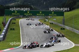 Max Verstappen (NLD) Scuderia Toro Rosso STR10 leads Valtteri Bottas (FIN) Williams FW37. 21.06.2015. Formula 1 World Championship, Rd 8, Austrian Grand Prix, Spielberg, Austria, Race Day.