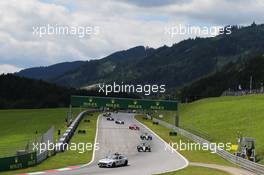 Nico Rosberg (GER) Mercedes AMG F1 W06 leads behind the FIA Safety Car. 21.06.2015. Formula 1 World Championship, Rd 8, Austrian Grand Prix, Spielberg, Austria, Race Day.