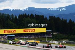 Will Stevens (GBR) Manor Marussia F1 Team at the start of the race as Kimi Raikkonen (FIN) Ferrari SF15-T ahead loses control. 21.06.2015. Formula 1 World Championship, Rd 8, Austrian Grand Prix, Spielberg, Austria, Race Day.