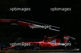 The Ferrari SF15-T of Kimi Raikkonen (FIN) Ferrari is recovered back to the pits on the back of a truck. 21.06.2015. Formula 1 World Championship, Rd 8, Austrian Grand Prix, Spielberg, Austria, Race Day.