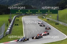 Marcus Ericsson (SWE) Sauber C34 leads Daniil Kvyat (RUS) Red Bull Racing RB11 who has a broken front wing. 21.06.2015. Formula 1 World Championship, Rd 8, Austrian Grand Prix, Spielberg, Austria, Race Day.