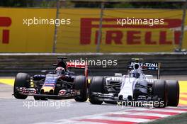 Valtteri Bottas (FIN) Williams FW37 and Max Verstappen (NLD) Scuderia Toro Rosso STR10 battle for position. 21.06.2015. Formula 1 World Championship, Rd 8, Austrian Grand Prix, Spielberg, Austria, Race Day.