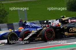 Pastor Maldonado (VEN) Lotus F1 E23 and Felipe Nasr (BRA) Sauber C34 battle for position. 21.06.2015. Formula 1 World Championship, Rd 8, Austrian Grand Prix, Spielberg, Austria, Race Day.