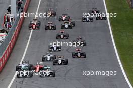 Start of the race, Nico Rosberg (GER), Mercedes AMG F1 Team and Lewis Hamilton (GBR), Mercedes AMG F1 Team  21.06.2015. Formula 1 World Championship, Rd 8, Austrian Grand Prix, Spielberg, Austria, Race Day.