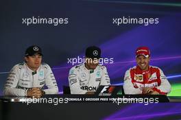 The post qualifying FIA Press Conference (L to R): Nico Rosberg (GER) Mercedes AMG F1, second; Lewis Hamilton (GBR) Mercedes AMG F1, pole position; Sebastian Vettel (GER) Ferrari, third. 20.06.2015. Formula 1 World Championship, Rd 8, Austrian Grand Prix, Spielberg, Austria, Qualifying Day.