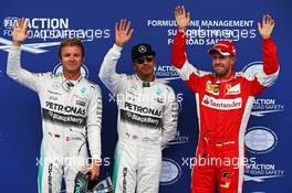 Qualifying top three in parc ferme (L to R): Nico Rosberg (GER) Mercedes AMG F1, second; Lewis Hamilton (GBR) Mercedes AMG F1, pole position; Sebastian Vettel (GER) Ferrari, third. 20.06.2015. Formula 1 World Championship, Rd 8, Austrian Grand Prix, Spielberg, Austria, Qualifying Day.