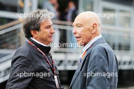 (L to R): Pasquale Lattuneddu (ITA) of the FOM with Peter Brabeck-Letmathe (AUT) Formula One Chairman. 20.06.2015. Formula 1 World Championship, Rd 8, Austrian Grand Prix, Spielberg, Austria, Qualifying Day.
