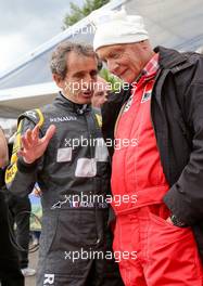 (L to R): Alain Prost (FRA) and Niki Lauda (AUT) Mercedes Non-Executive Chairman at the Legends Parade. 20.06.2015. Formula 1 World Championship, Rd 8, Austrian Grand Prix, Spielberg, Austria, Qualifying Day.