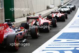 Nico Rosberg (GER) Mercedes AMG F1 W06; Lewis Hamilton (GBR) Mercedes AMG F1 W06; Sebastian Vettel (GER) Ferrari SF15-T; Kimi Raikkonen (FIN) Ferrari SF15-T; and Max Verstappen (NLD) Scuderia Toro Rosso STR10 at the end of the pit lane. 20.06.2015. Formula 1 World Championship, Rd 8, Austrian Grand Prix, Spielberg, Austria, Qualifying Day.