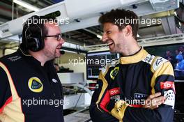 (L to R): Julien Simon-Chautemps (FRA) Lotus F1 Team Race Engineer with Romain Grosjean (FRA) Lotus F1 Team. 20.06.2015. Formula 1 World Championship, Rd 8, Austrian Grand Prix, Spielberg, Austria, Qualifying Day.