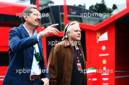 (L to R): Guenther Steiner (ITA) Haas F1 Team Prinicipal with Gene Haas (USA) Haas Automotion President. 20.06.2015. Formula 1 World Championship, Rd 8, Austrian Grand Prix, Spielberg, Austria, Qualifying Day.