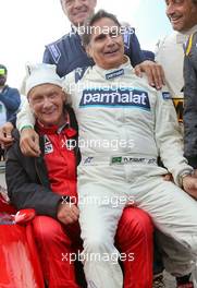 (L to R): Niki Lauda (AUT) Mercedes Non-Executive Chairman and Nelson Piquet (BRA) at the Legends Parade. 20.06.2015. Formula 1 World Championship, Rd 8, Austrian Grand Prix, Spielberg, Austria, Qualifying Day.