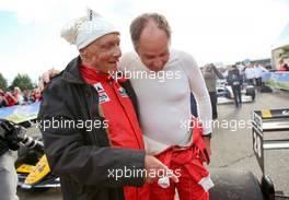 (L to R): Niki Lauda (AUT) Mercedes Non-Executive Chairman and Gerhard Berger (AUT) at the Legends Parade. 20.06.2015. Formula 1 World Championship, Rd 8, Austrian Grand Prix, Spielberg, Austria, Qualifying Day.