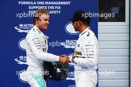 (L to R): second placed Nico Rosberg (GER) Mercedes AMG F1 with team mate Lewis Hamilton (GBR) Mercedes AMG F1, who took pole position. 20.06.2015. Formula 1 World Championship, Rd 8, Austrian Grand Prix, Spielberg, Austria, Qualifying Day.