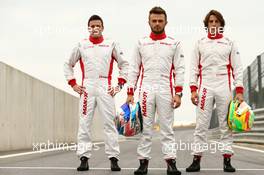 (L to R): Fabio Leimer (SUI) Manor Marussia F1 Team Reserve Driver with Will Stevens (GBR) Manor Marussia F1 Team and Roberto Merhi (ESP) Manor Marussia F1 Team. 18.06.2015. Formula 1 World Championship, Rd 8, Austrian Grand Prix, Spielberg, Austria, Preparation Day.