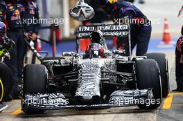 Daniil Kvyat (RUS) Red Bull Racing RB11 practices a pit stop. 21.02.2015. Formula One Testing, Day Three, Barcelona, Spain.