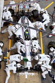 Felipe Massa (BRA) Williams FW37 practices a pit stop. 21.02.2015. Formula One Testing, Day Three, Barcelona, Spain.