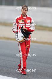 Sebastian Vettel (GER) Ferrari returns to the pits after spinning off the circuit. 21.02.2015. Formula One Testing, Day Three, Barcelona, Spain.
