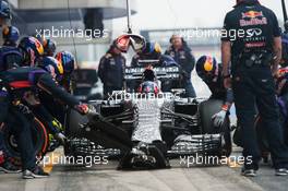 Daniil Kvyat (RUS) Red Bull Racing RB11 practices a pit stop. 21.02.2015. Formula One Testing, Day Three, Barcelona, Spain.