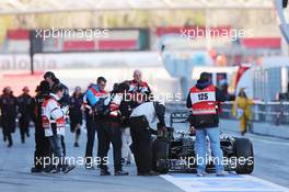 Daniil Kvyat (RUS) Red Bull Racing RB11 stops in the pit lane. 22.02.2015. Formula One Testing, Day Four, Barcelona, Spain.